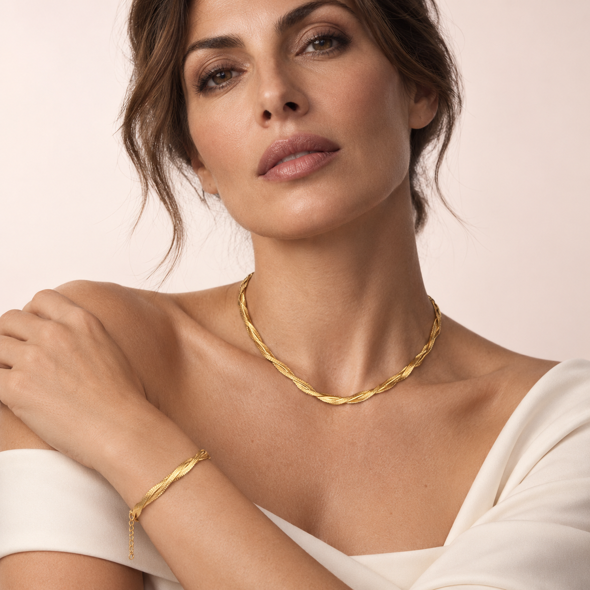 Set Collana e Bracciale Intrecciati 18K - elegante e raffinato